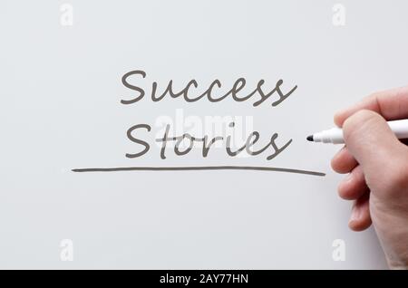 Success stories written on whiteboard Banque D'Images