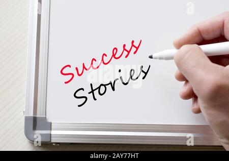 Success stories written on whiteboard Banque D'Images