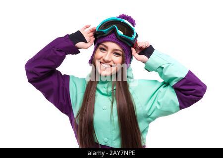 Jeune femme en tenue de ski violet Banque D'Images