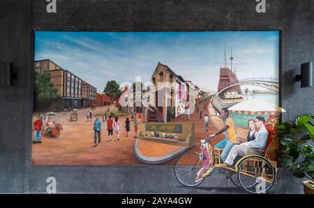 Peinture murale représentant les sites touristiques de la ville de Melacca affichés en face de l'hôtel à Melacca, en Malaisie. Banque D'Images