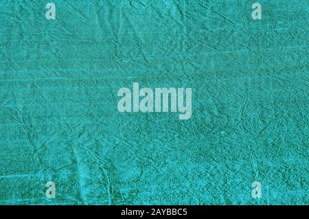 Texture de la soie de shantung turquoise closeup comme fond textile Banque D'Images