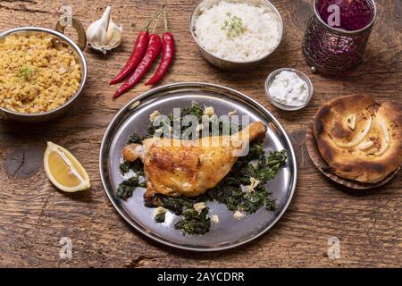 Poulet indien sur bois sombre Banque D'Images