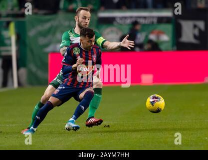 Lyes Houri of MOL Fehervar FC challenges David Siger of