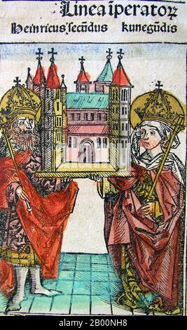 Allemagne: 'Henry II et Cunegundis'. The Nuremberg Chronicle, par Hartmann Schedel (1440-1514), 1493. La chronique de Nuremberg est une histoire du monde illustrée. Sa structure suit l'histoire de l'histoire humaine telle qu'elle est liée dans la Bible, y compris l'histoire d'un certain nombre de villes occidentales importantes. Écrit en latin par Hartmann Schedel, avec une version en allemand de Georg Alt, il est apparu en 1493. Il s'agit de l'un des livres imprimés les mieux documentés. Il est classé comme un incunabulum, un livre, une brochure ou un grand format qui a été imprimé (non manuscrit) avant l'année 1501 en Europe. Banque D'Images