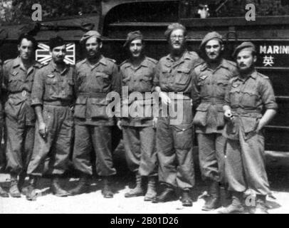 Vietnam : troupes britanniques à Saigon à la fin de la Seconde Guerre mondiale, 1945-1946. En septembre 1945, 20 000 soldats britanniques de la division indienne 20th ont occupé Saigon sous le commandement du général Sir Douglas David Gracey. Lors de la Conférence de Potsdam en juillet 1945, les alliés avaient convenu que la Grande-Bretagne prenait le contrôle du Vietnam au sud du parallèle de 16th (qui faisait alors partie de l'Indochine française) des occupants japonais. Pendant ce temps, Ho Chi Minh, chef du communiste Viet Minh, a proclamé l'indépendance vietnamienne du pouvoir français et d'importantes manifestations pro-indépendantistes et anti-françaises ont eu lieu à Saigon. Banque D'Images