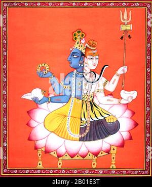 Inde: Peinture de Harihara représentant l'Union de Vishnu et Shiva, début 20th siècle. Harihara est le nom d'une forme de divinité combinée de Vishnu (Hari) et Shiva (Hara) de la tradition hindoue. Aussi connu sous le nom de Shankaranarayana - où 'Shankara' est Shiva, et 'Narayana' est Vishnu - Harihara est adoré par Vaishnavites et Shaivites comme une forme du Dieu Suprême, ainsi que d'être une figure de culte pour d'autres traditions hindoues en général. Harihara est aussi parfois utilisé comme terme philosophique pour désigner l'unité de Vishnu et Shiva comme des aspects différents du même Dieu Suprême. Banque D'Images