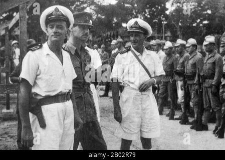 En septembre 1945, 20 000 soldats britanniques de la vingtième Division indienne occupaient Saigon sous le commandement du général Sir Douglas David Gracey. Lors de la Conférence de Potsdam en juillet 1945, les Alliés avaient convenu que la Grande-Bretagne prenait le contrôle du Vietnam au sud du XVIe parallèle (alors partie de l'Indochine française) des occupants japonais. Pendant ce temps, Ho Chi Minh a proclamé l'indépendance vietnamienne du gouvernement français et d'importantes manifestations pro-indépendantes et anti-françaises ont eu lieu à Saigon. Ho Chi Minh était le chef du Viet Minh communiste. Les Français, soucieux de conserver leur colonie, ont persuadé Grace Banque D'Images