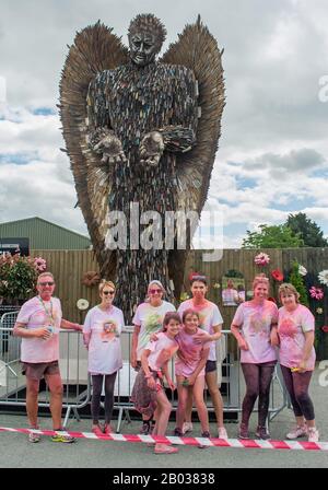 Course de colur tenue dans le Shropshire de l'Oswestry dans l'aide de Macmillan Cancer charité. Banque D'Images