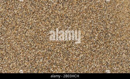 Près de sable sur une plage. Fond de texture naturelle Banque D'Images