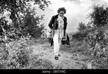 Imprimé vintage représentant le compositeur et pianiste allemand Ludwig van Beethoven (1770 – 1827) en pleine nature. Imprimé vers 1910 par la société photographique de Berlin basé sur une peinture de Julius Schmid. Banque D'Images