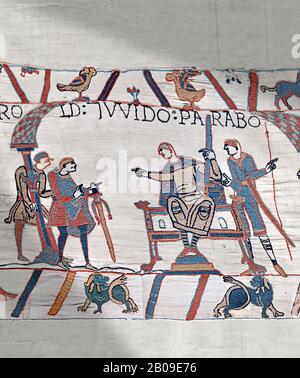 Scène de la Tapisserie de Bayeux 9 : Guy de Ponthieu, sur le trône, a discuté avec Harold ses demandes de rançon. Banque D'Images