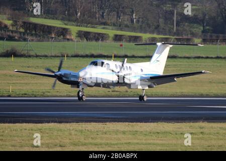 G-l'IASM, un Beechcraft B200 Super King Air exploité par Aviation 2Excel/Glaive Aviation, à l'Aéroport International de Prestwick en Ayrshire. Banque D'Images