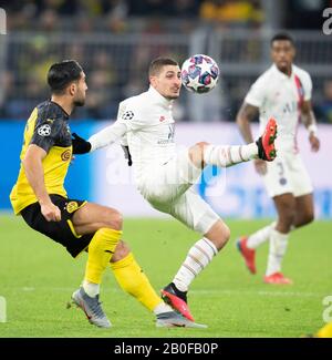 Marco VERRATTI r. (PSG) duels contre Emre CAN (DO), action, Ligue des Champions du football, ronde de 16 première jambe, Borussia Dortmund (DO) - Paris St. Germain (PSG) 2: 1, le 02/18/2020 à Dortmund/Allemagne. Â | utilisation dans le monde entier Banque D'Images