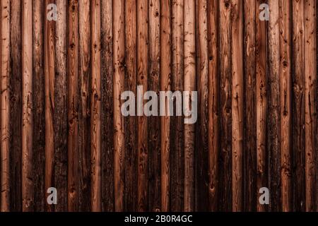 WOM a endommagé la paroi en bois en marron comme fond ou texture Banque D'Images