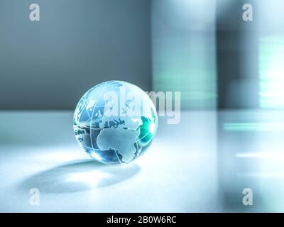 Un globe de verre de la planète Terre illustrant le commerce mondial et le réseautage. Banque D'Images