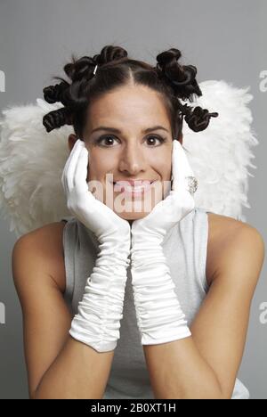 Jeune femme vêtue comme ange de Noël, Banque D'Images