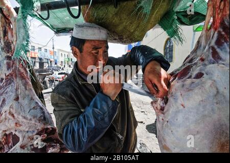 Les musulmans chinois, les Hui minorité ethnique. Boucher à Xinning. Chine Banque D'Images