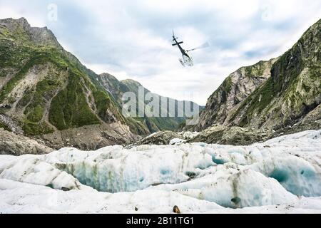 Hélicoptère Sur Le Glacier Franz Josef, Nouvelle-Zélande Banque D'Images
