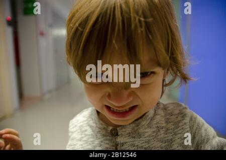 Blonde Angry Boy (Editorial) Banque D'Images