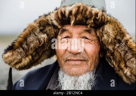 Les hommes mongoles en Chine de la minorité ethnique Meng, Xinjiang. Chine Banque D'Images