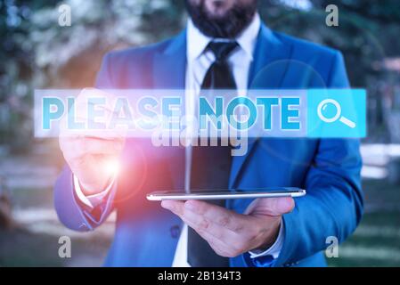 Écrit remarque montrant Veuillez prendre note. Concept d'affaires de façon formelle pour diriger montrant s est l'attention sur certaines informations Banque D'Images