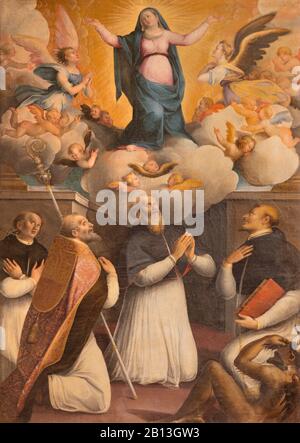 RAVENNE, ITALIE - 28 JANVIER 2020 : la peinture de la Vierge Marie et de Saint Augustin et d'autres saints dans l'église Basilique de Santa Maria del Porto (1605). Banque D'Images