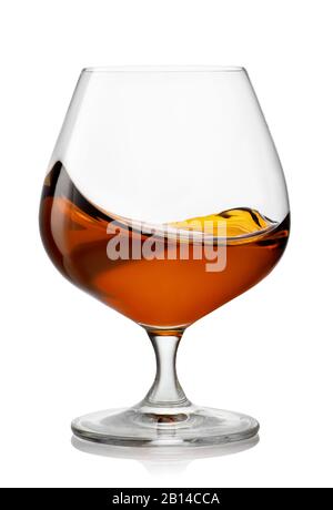 un peu de brandy dans un verre de neige Banque D'Images