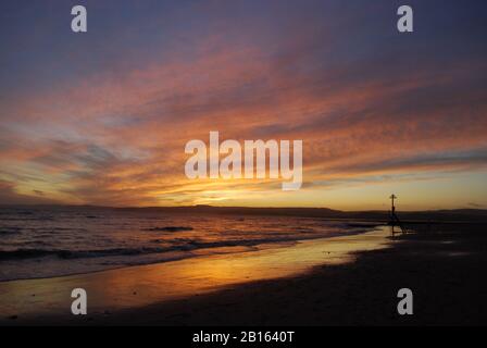Coucher De Soleil À Exmouth Beach, Devon, Angleterre Banque D'Images