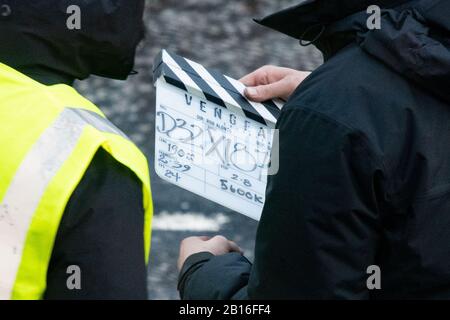 Glasgow, Écosse, Royaume-Uni. 23 février 2020. « Vengeance » repérée sur le panneau de clapper lors du tournage du nouveau film Batman Credit: Kay Roxby/Alay Live News Banque D'Images