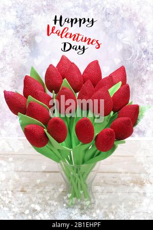 Roses artificielles rouges avec Inscription Happy Valentines Day Banque D'Images