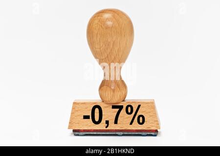 un cachet avec l'inscription moins 0,7 pour cent Banque D'Images