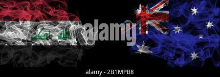 Drapeaux de l'Irak et de l'Australie sur fond noir, l'Irak contre l'Australie Smoke Flags Banque D'Images