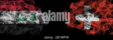 Drapeaux de l'Irak et de la Suisse sur fond noir, l'Irak contre la Suisse drapeaux de fumée Banque D'Images