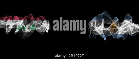 Drapeaux de l'Irak et de l'Argentine sur fond noir, Irak vs Argentine Smoke Flags Banque D'Images