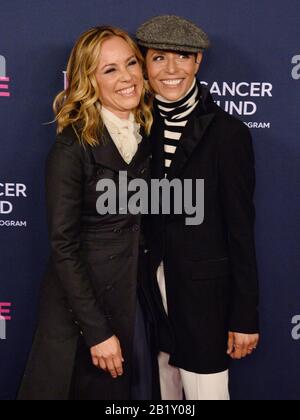 Beverly Hills, États-Unis. 27 février 2020. L'actrice américaine Maria Bello (L) et le chef français partenaire Dominique Crenn assistent À Une Soirée Inoubliable bénéficiant du Fonds de recherche sur le cancer pour les femmes à l'hôtel Beverly Wilshire à Beverly Hills, Californie, le jeudi 27 février 2020. Photo de Jim Ruymen/UPI crédit: UPI/Alay Live News Banque D'Images