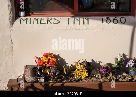 Mineurs Inn 1860 peint au mur à Shep's Miners Inn & Antan Restaurant, Chlorure, Arizona, 86431, États-Unis. Banque D'Images