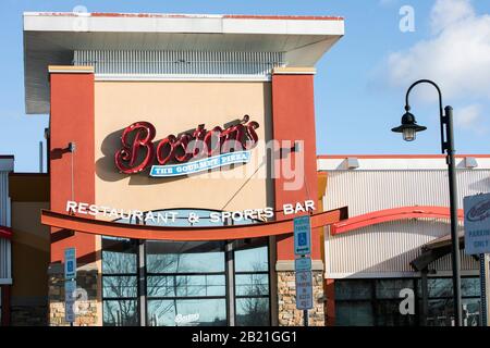 Un logo à l'extérieur d'une Boston Pizza, Boston's The Gourmet Pizza Restaurant and Sports Bar restaurant situé à Waldorf, Maryland, le 27 février, Banque D'Images