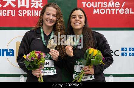 Montréal, Québec, Canada. 28 février 2020. Meaghan Benfeito, à droite, et Caeli McKay, du Canada, détiennent leurs médailles d'or après avoir remporté la finale synchro plate-forme de 10 mètres de femmes à la série mondiale de plongée FINA à Montréal, crédit : Patrice Lapointe/ZUMA Wire/Alay Live News Banque D'Images