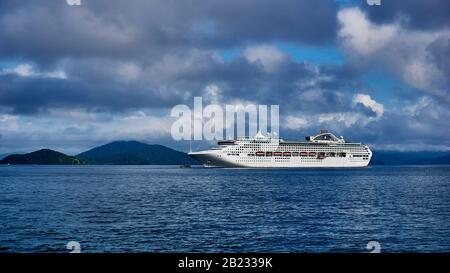 L'île Doini est située au coeur de la baie de Milne, à l'extrémité orientale de la Papouasie-Nouvelle-Guinée. Cette plantation a été initialement sondée par un gouvernement sur Banque D'Images