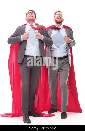 Deux collègues de capes rouges debout dans Superman poser Banque D'Images
