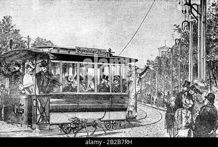 Le premier tramway électrique, qui a été alimenté en électricité par une ligne aérienne, s'est déroulé entre Westend et Spandauer Berg. Sur le tramway n° 65 le conducteur avertit les passants de l'approche du tramway en sonnant une cloche. Après un dessin de F. Wittig. Banque D'Images