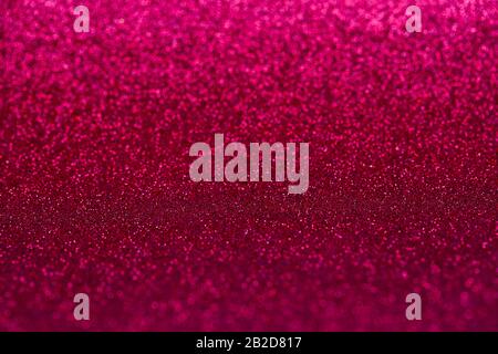 Rouge glitter vintage lumières fond. Bokeh léger Banque D'Images