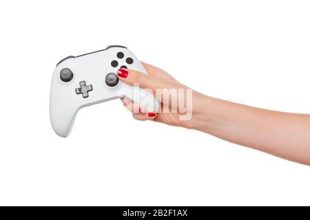 Console de jeux vidéo contrôleur dans les mains de joueur isolé sur fond blanc