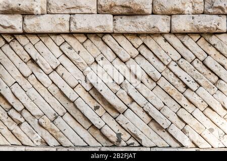 pierres de la texture de la paroi. Mur de roche arrière plein air. Banque D'Images