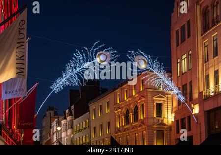 Bond Street, Londres la nuit pendant la période de noël. Banque D'Images