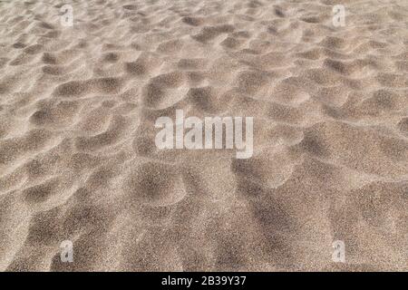 Plage de sable en gros plan en été.Dune-forme .Desert. Banque D'Images