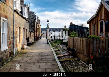 Promenade matinale autour de Footdee et Footdee Mission, un vieux village de pêcheurs à l'extrémité est du port d'Aberdeen, en Écosse. Fotos de rues vides. Banque D'Images