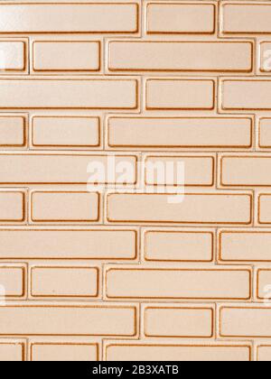 Fond de mur de briques en carreaux de céramique à l'extérieur. Image réalisée sur le téléphone portable Banque D'Images