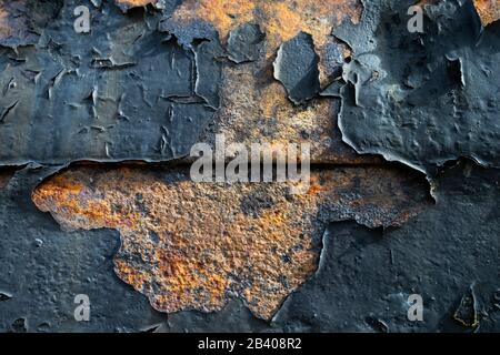 La photo montre une coque tissée où la peinture s'écaille partiellement. Banque D'Images