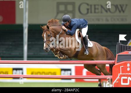 Fiabilité - Grand Prix CN Norman Dello Joio (USA) équitation Glasgow au Spruce Meadows National, Juin 2006 Banque D'Images